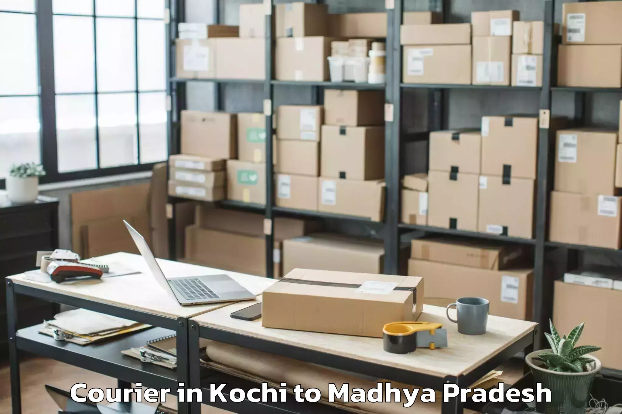 Affordable Kochi to Ganj Basoda Courier